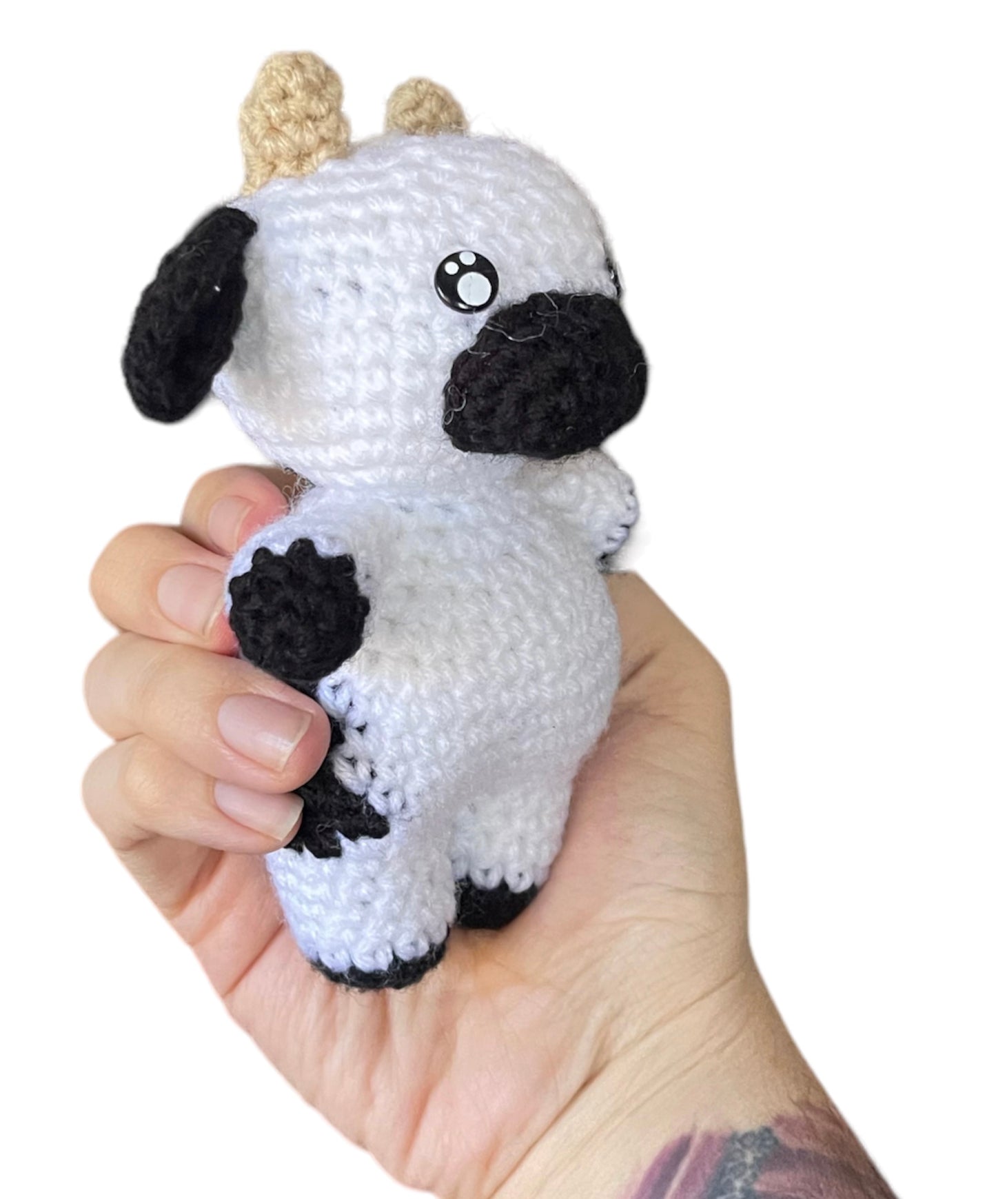 Tiny cow (black and white)